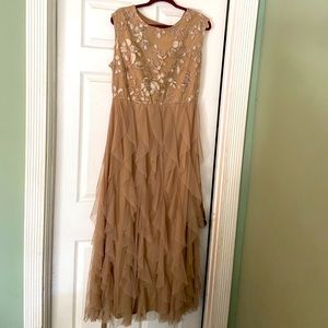 Beautiful ruffle skirt gown.